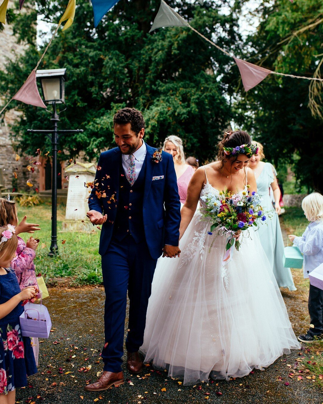 Confetti showers from this lovely teacher's school students. ​​​​​​​​
​​​​​​​​
Beth &amp; Charlie.