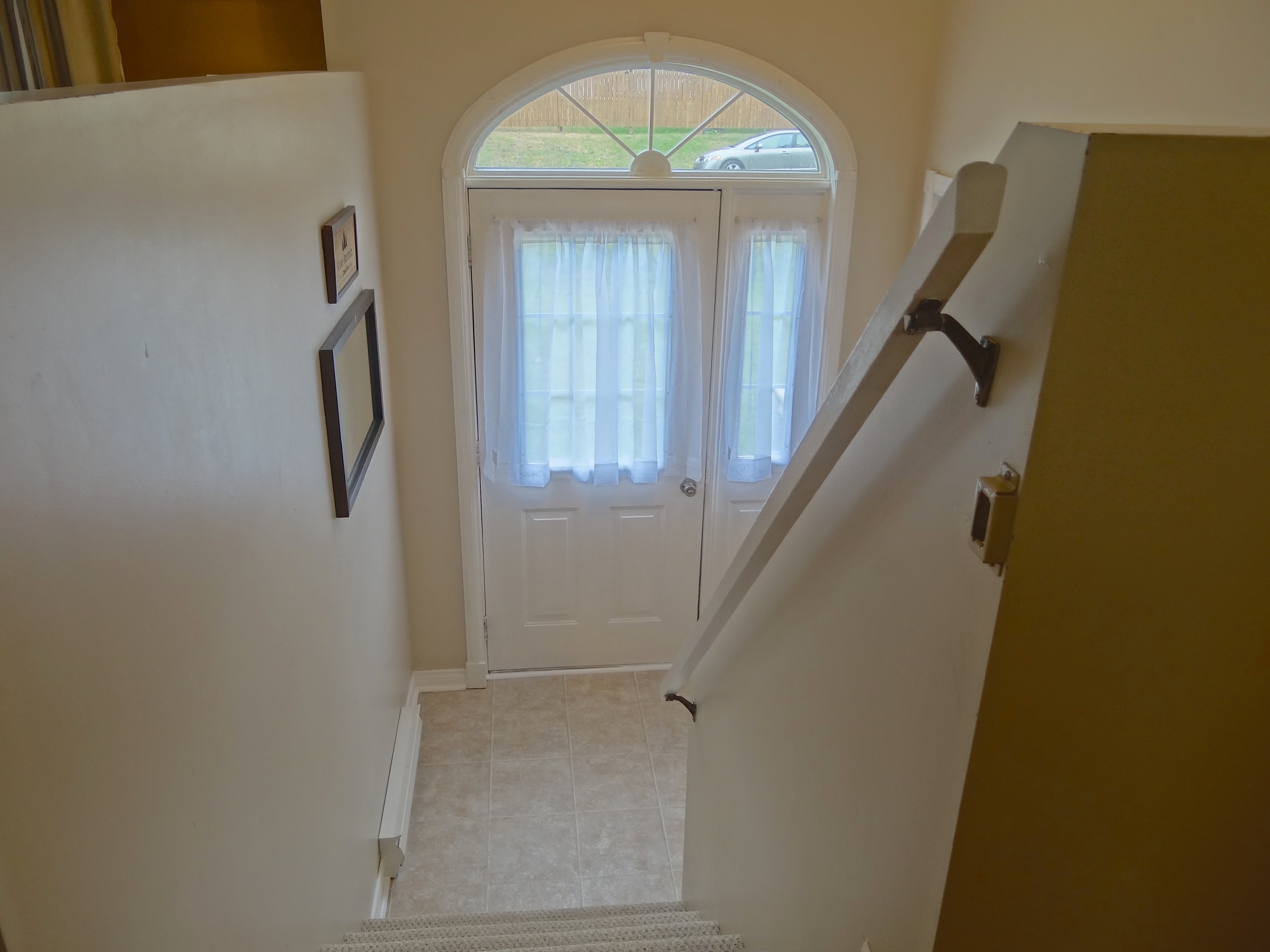 Stairs to front entry landing