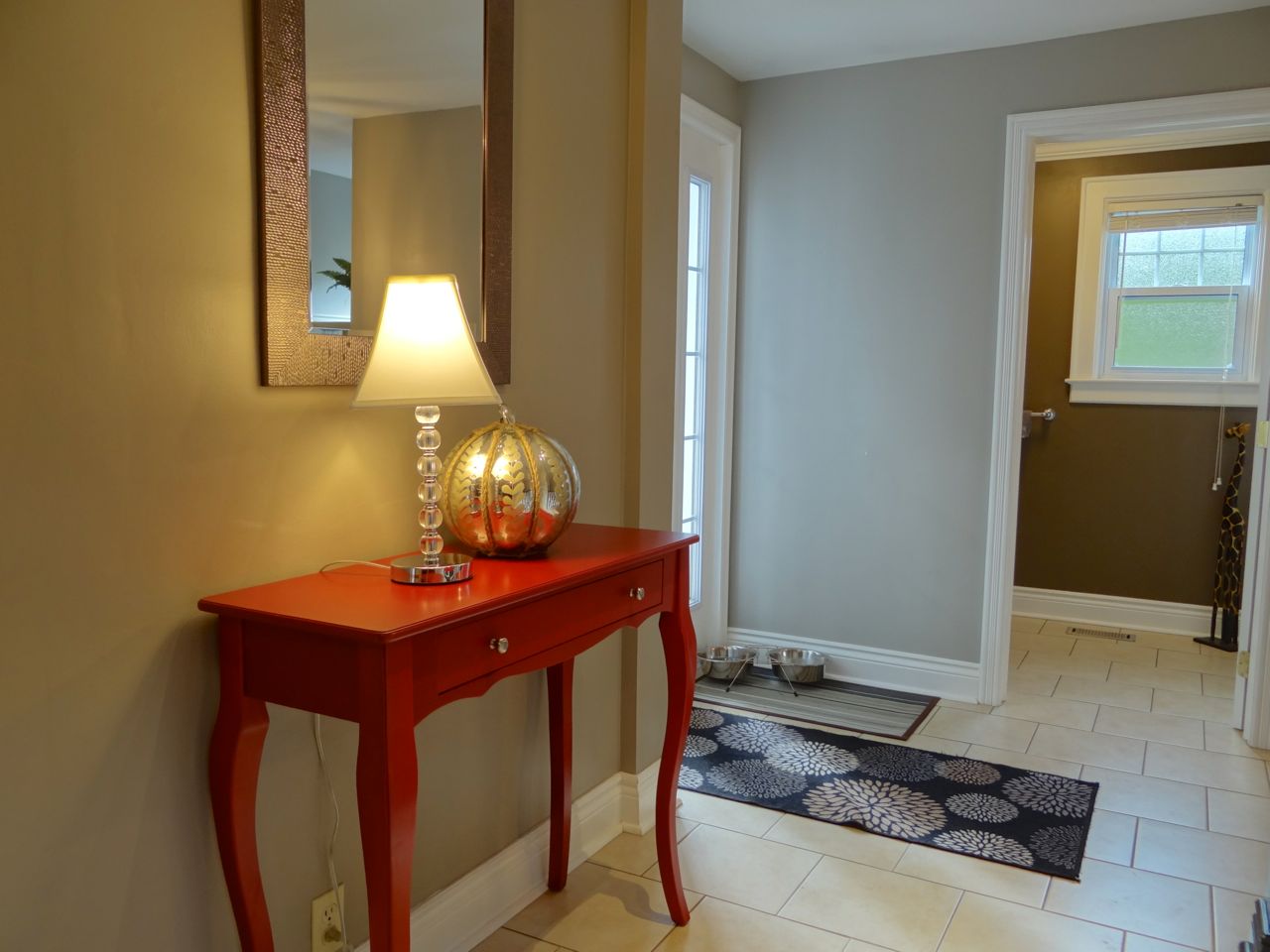 Hallway leading from the entry to kitchen.