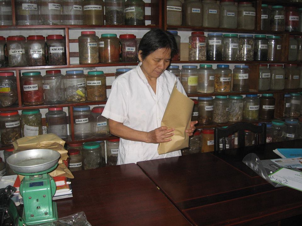 Dr. Thuan is preparing some Vietnamese Traditional Herbal Medicine for her patients