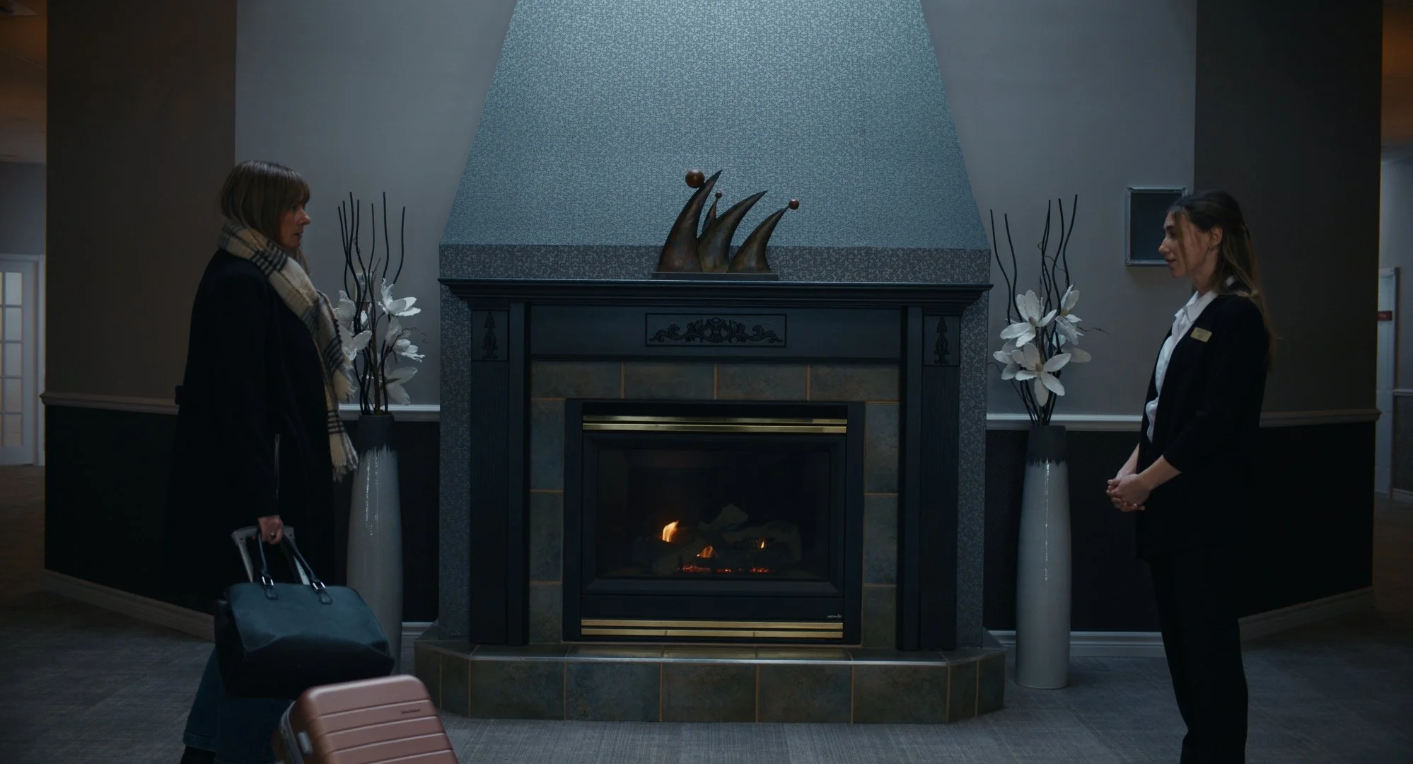 Zoey and Katherine meeting at the funeral home in SERENITY