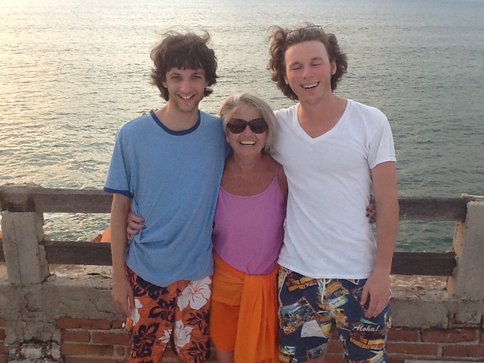 Experiencing the sun setting, Denise with students Liam Yates (left) and Tyler Carlson (right).