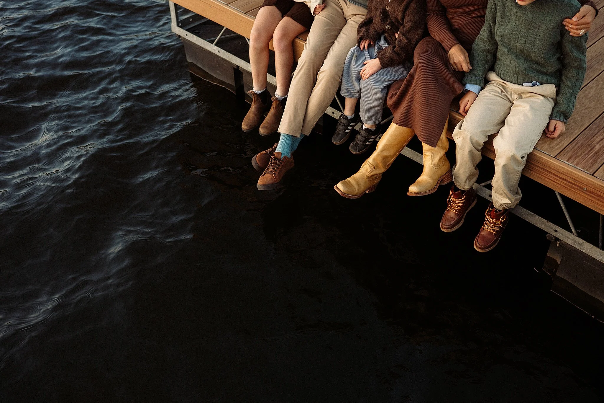 Family photos sitting on the dock at Allegheny RiverTrail Park in Aspinwall, PA