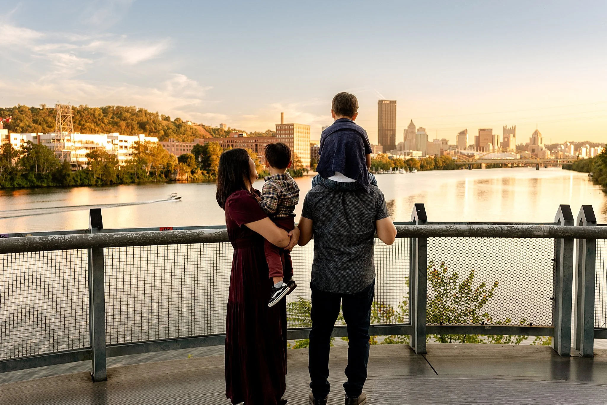 Family photos overlooking the Allegheny River at Washington's Landing in Pittsburgh, PA