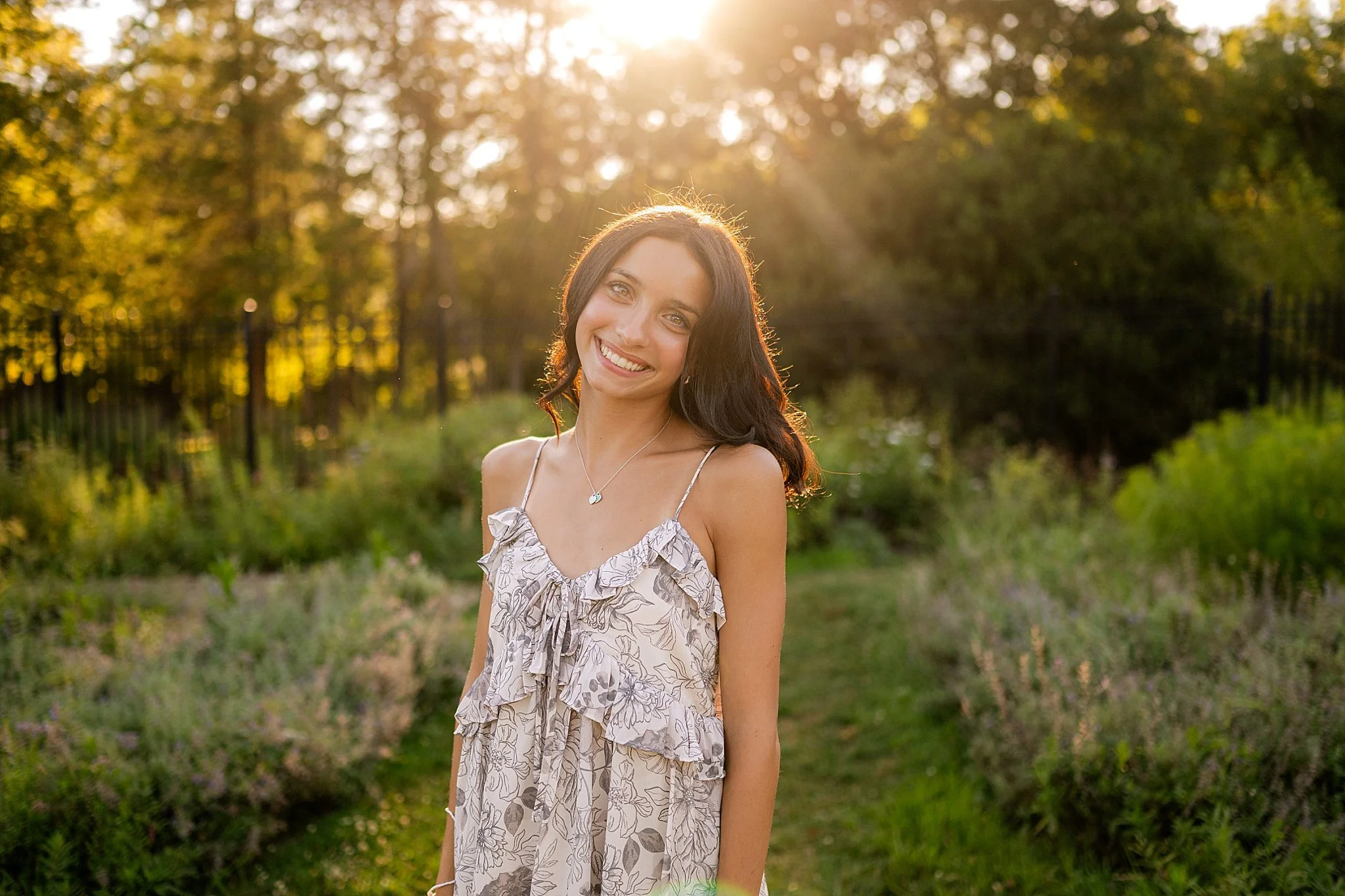 Golden hour senior session at a wildflower garden