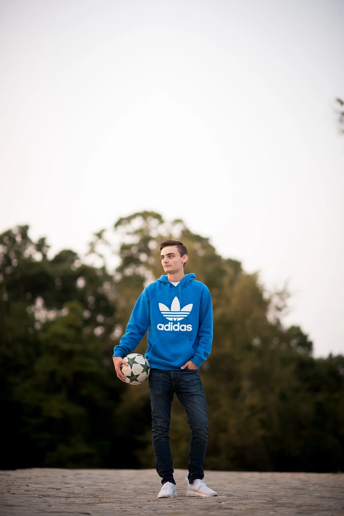 Boy senior session with soccer at Hartwood Acres Mansion
