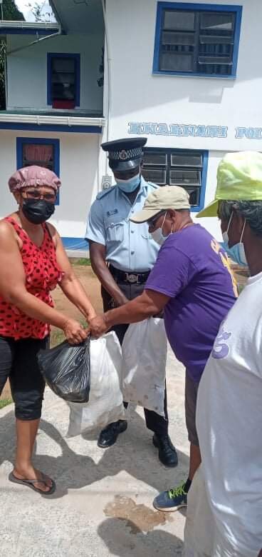 Pastor Prem in KK with flood relief pkgs.jpeg