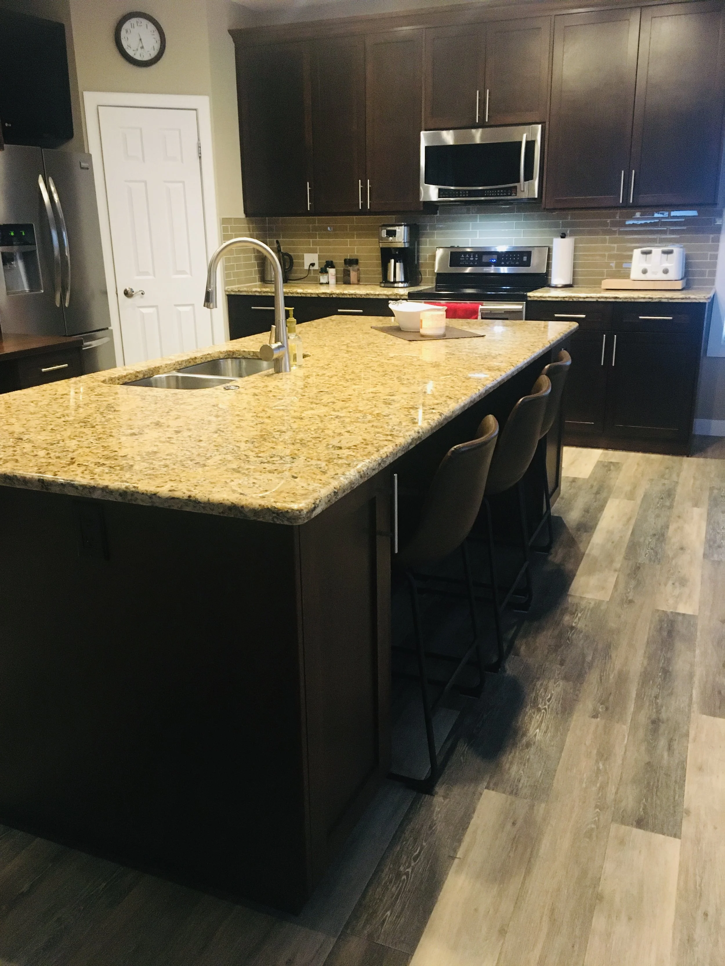 Finished!! Still has room for chairs so your family can gather around the island but now it's larger and one level giving you more room to prepare food and opening up the area #KS003