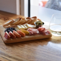 Harvest Board aged white cheddar, prosciutto, apples, pesto, crostini, & dried cranberries (try our GF version as well!)