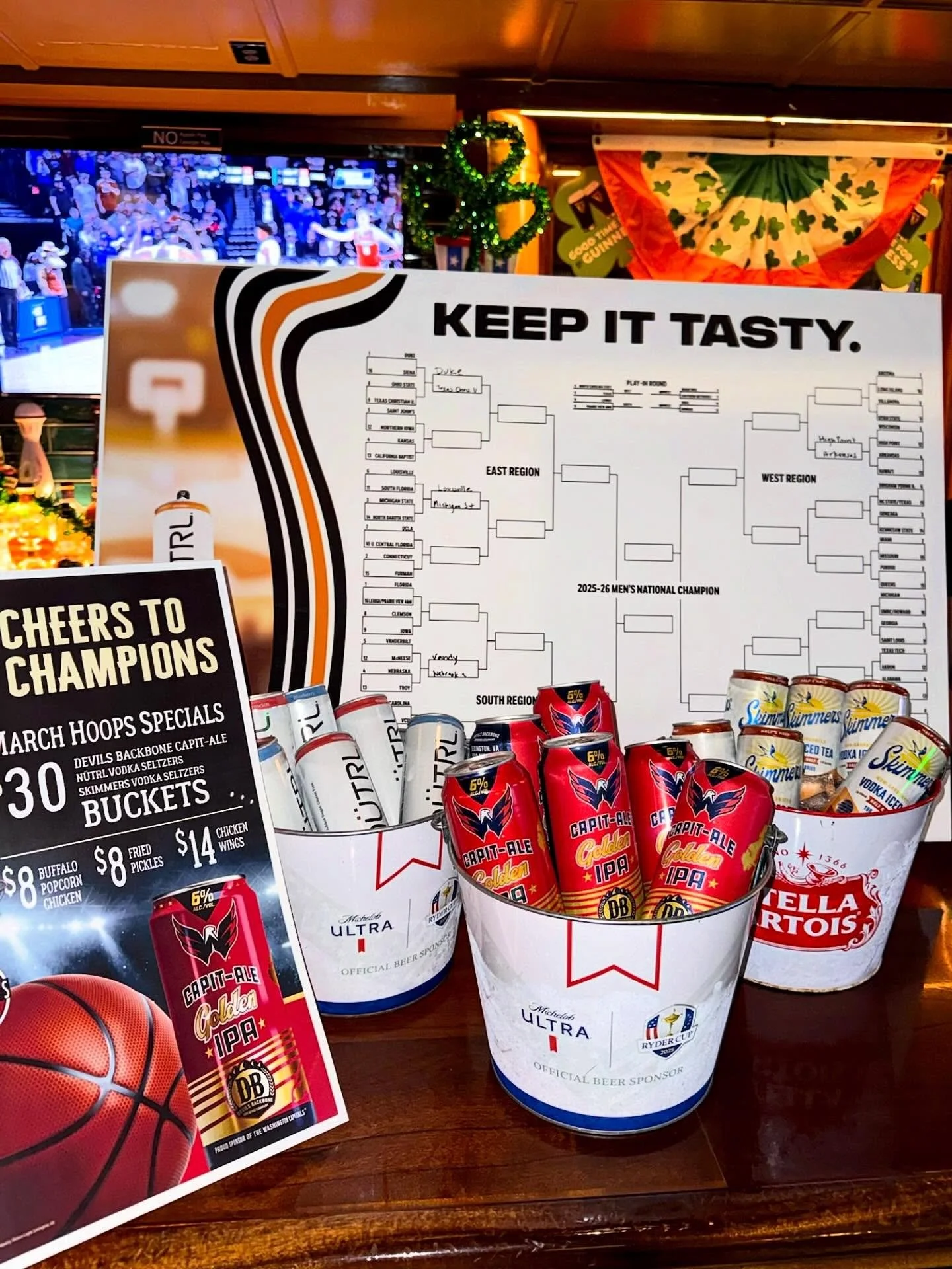 Tis the season! 🏀 Stop in for bucket and bite specials&hellip; available during all tournament games.