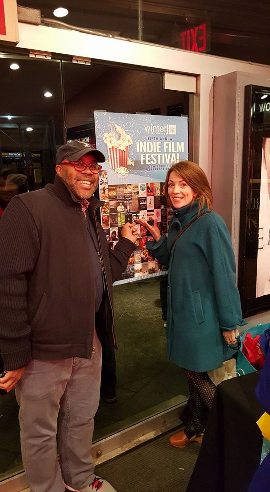 Before the screening. We were excited to find our logo on the festival poster!