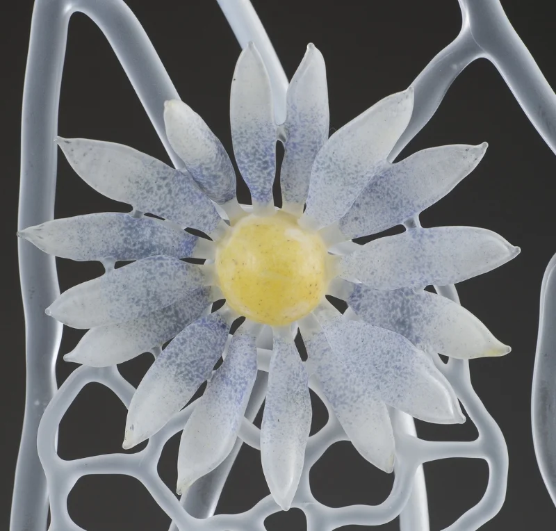 Approximately 4 inches, glass