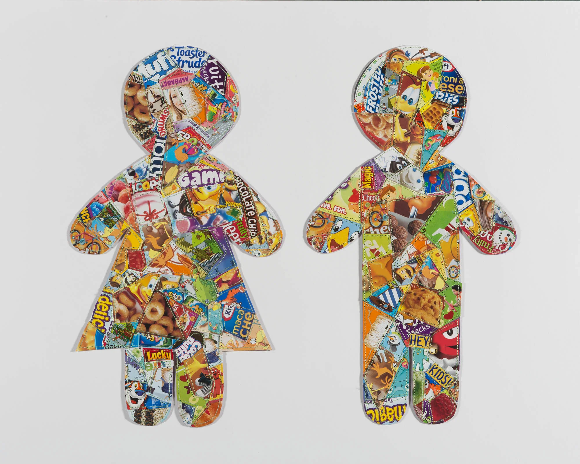 Sugar Children #1 . 2016, 19"h x 22"w framed, discarded food boxes, mixed media.