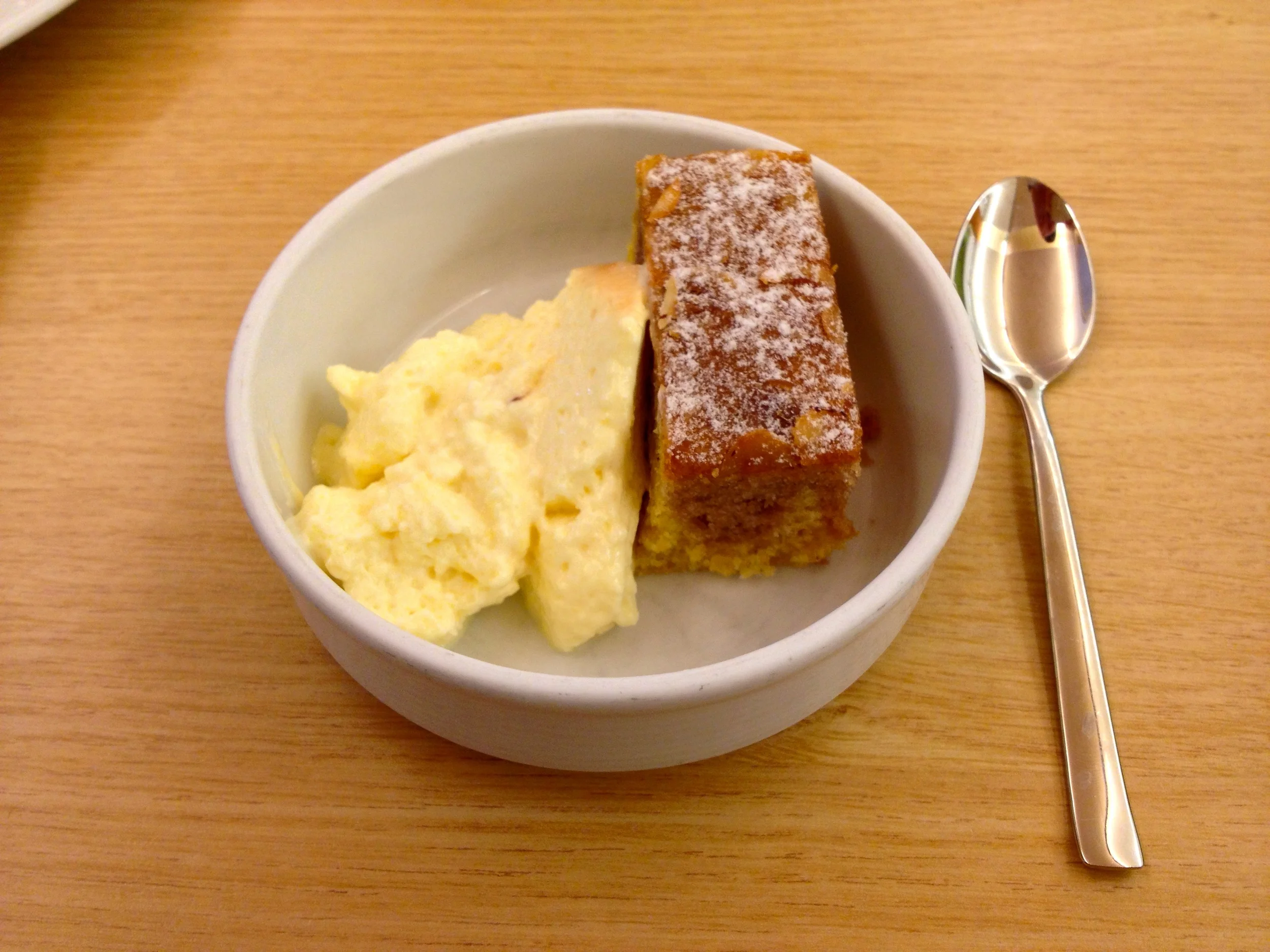 Dessert of custard and almond cake