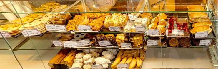 Other sweets at Bäckerei Frank , including chocolate croissants, cookies, Bobbes, meringues, apple tarts, sweet breads, and more