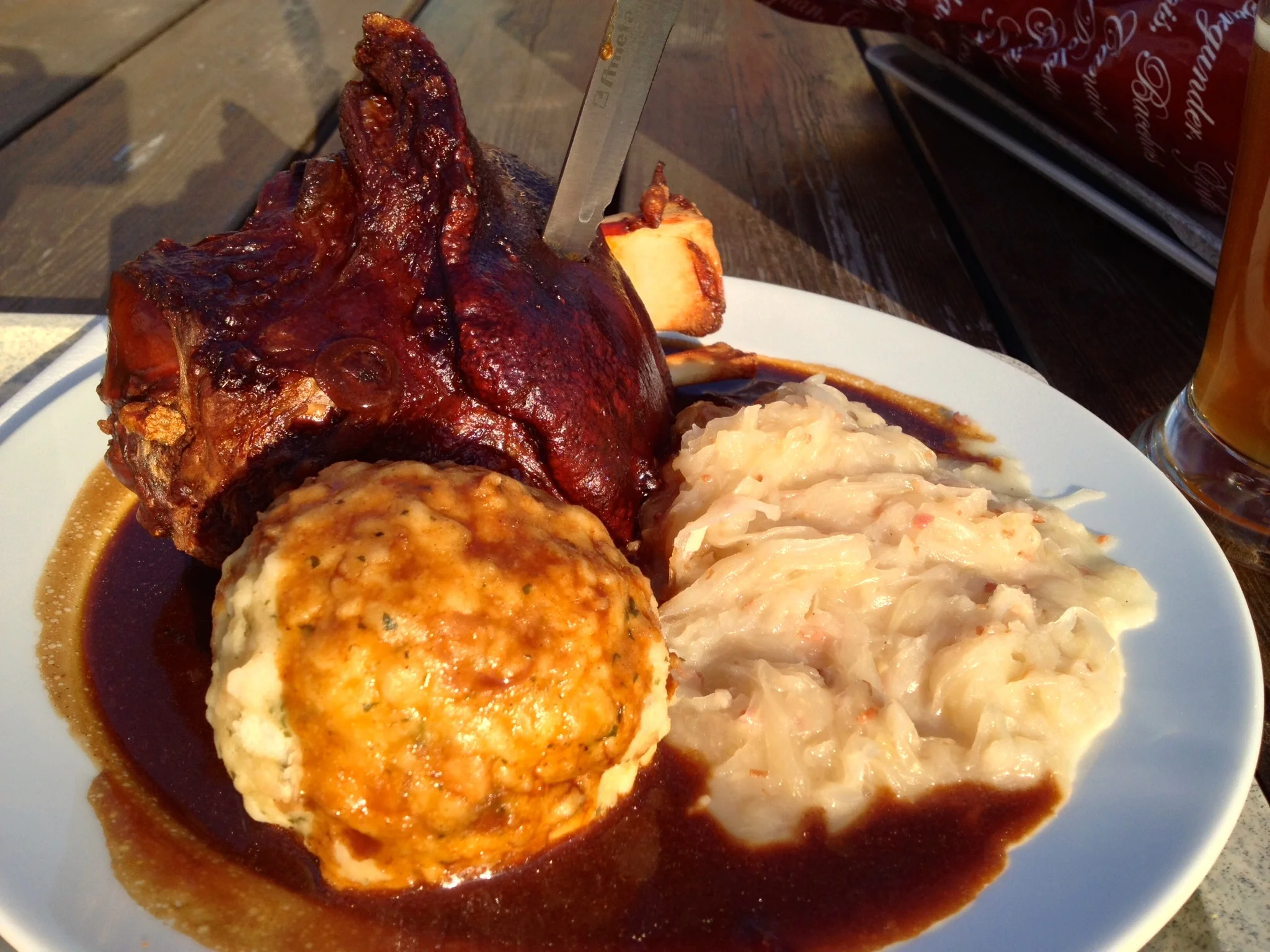 Schweinshaxe mit sauerkraut und s emmelknödel (pork knuckle with cabbage and a dumpling)