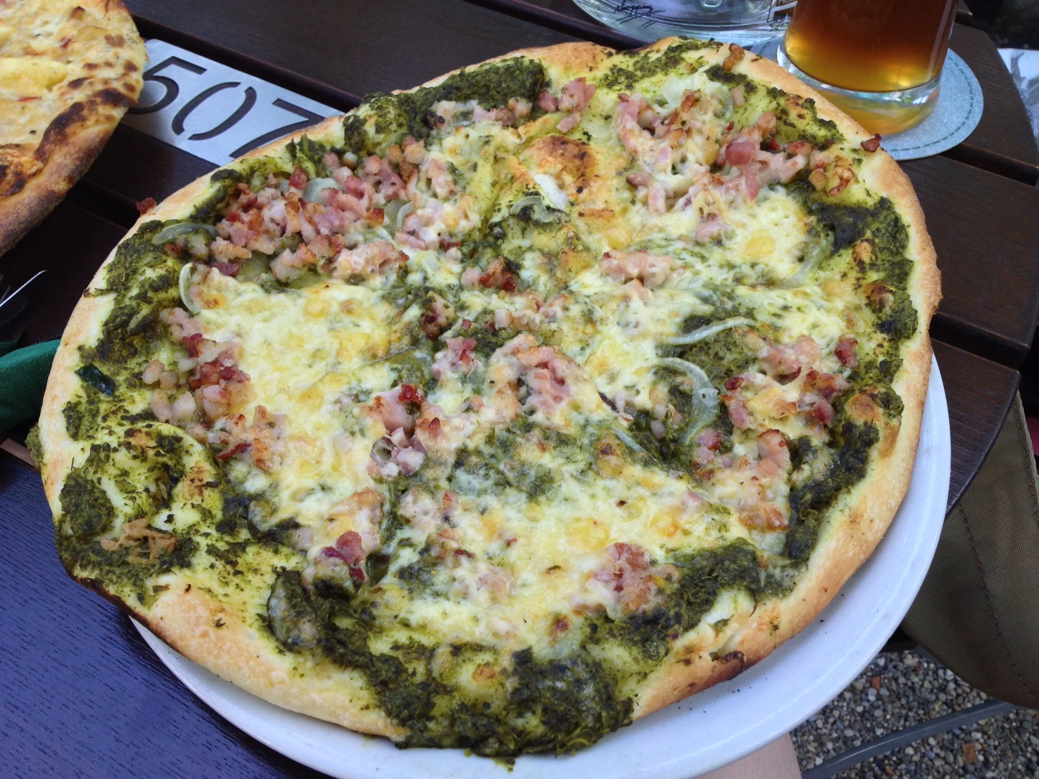 Wichtelkuchen with cream, spinach, cheese, onion, and bacon at Wichtel Hausbrauerei