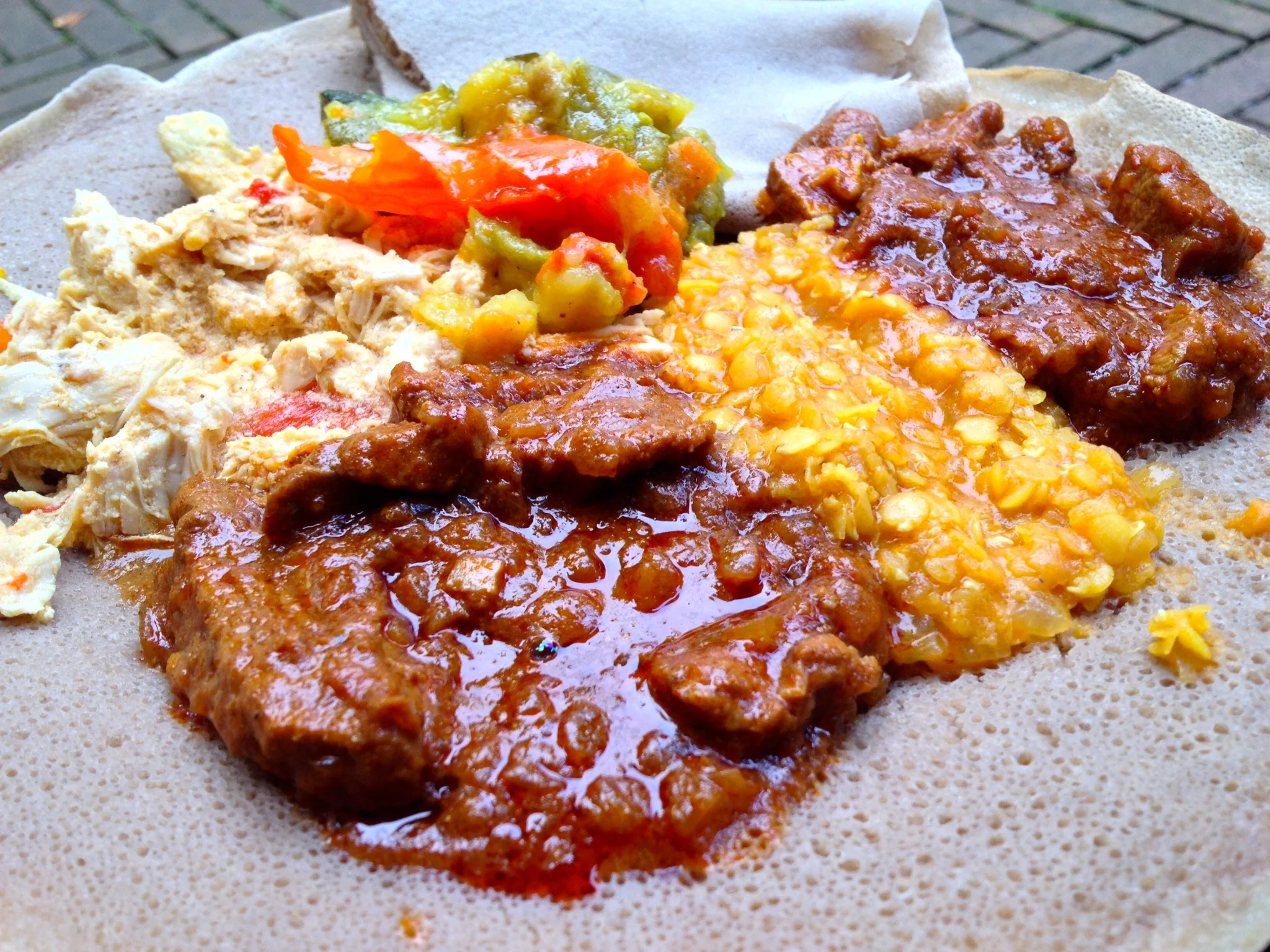 Tasting platter (chicken, beef, and lamb) from Injeera at the Bohnenviertelfest 2014