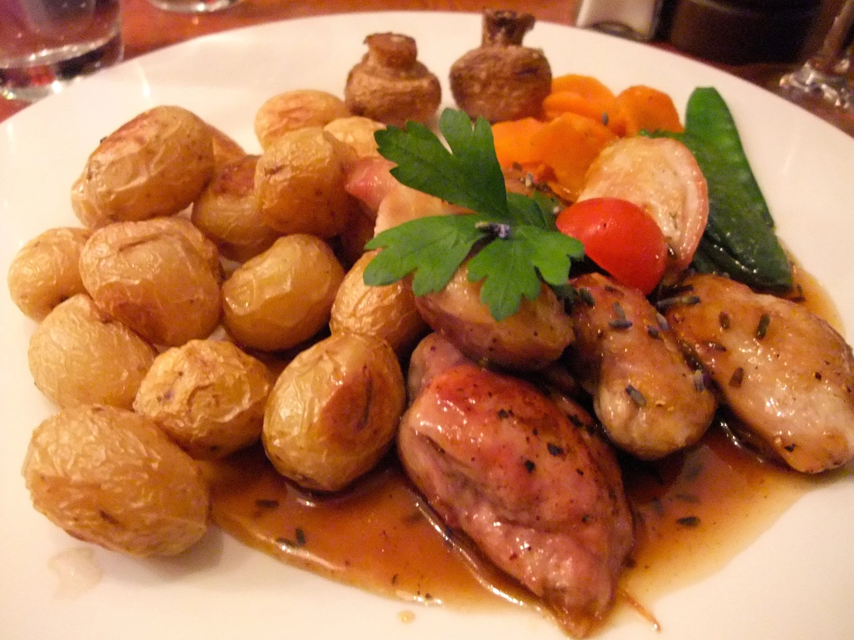 Quail breasts with a honey-lavender sauce and pan-fried potatoes at La Vache et le Cuisinier (Paris)