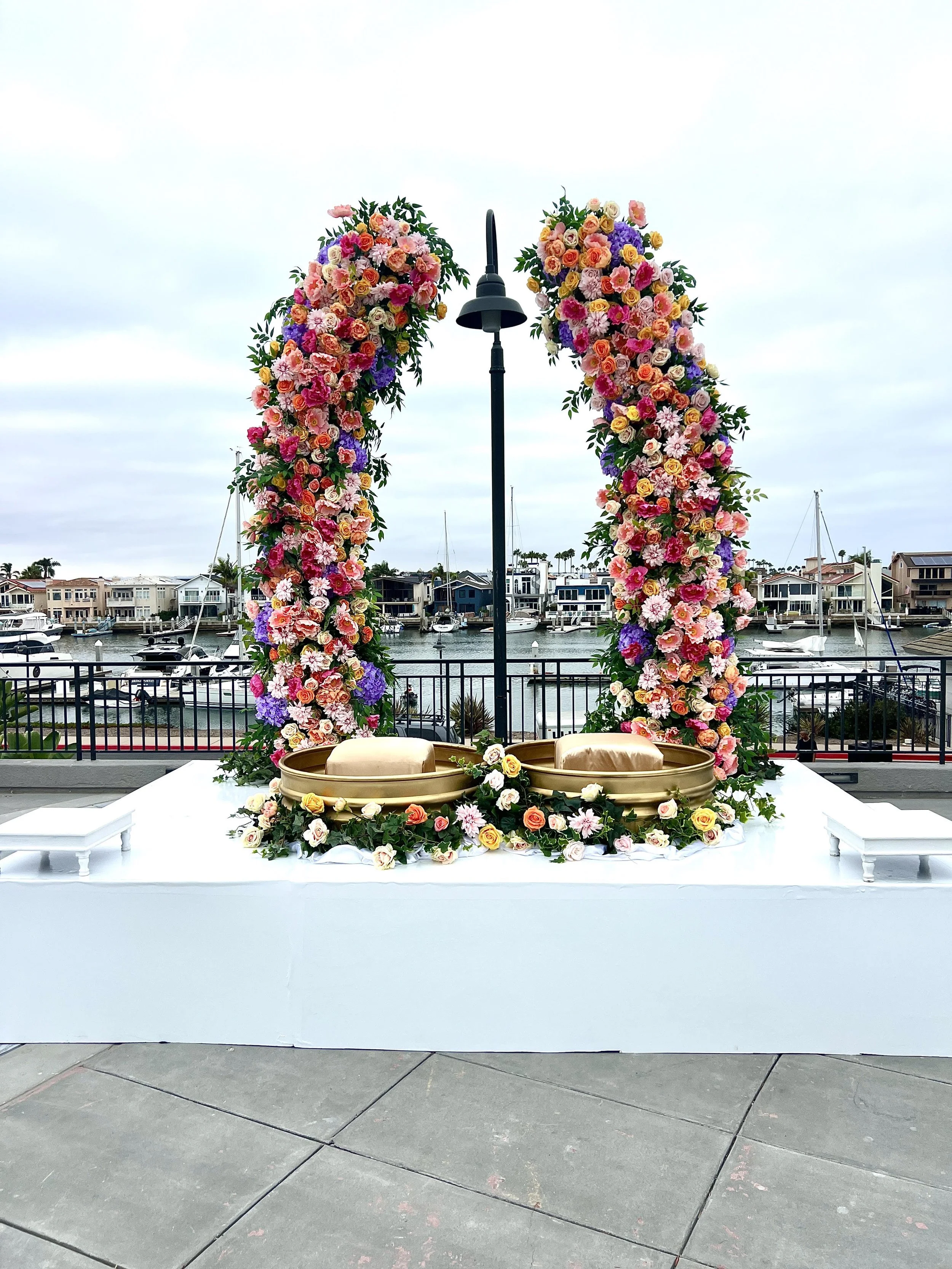 Curved Floral arches for Haldi Decor.jpg