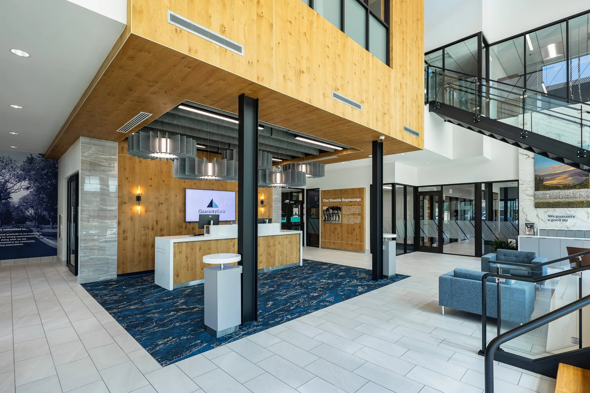 Photographed by Sully Clemmer, the installed wall graphic can be seen in the lobby to the left. Architect and Interior Design: Dean Architecture