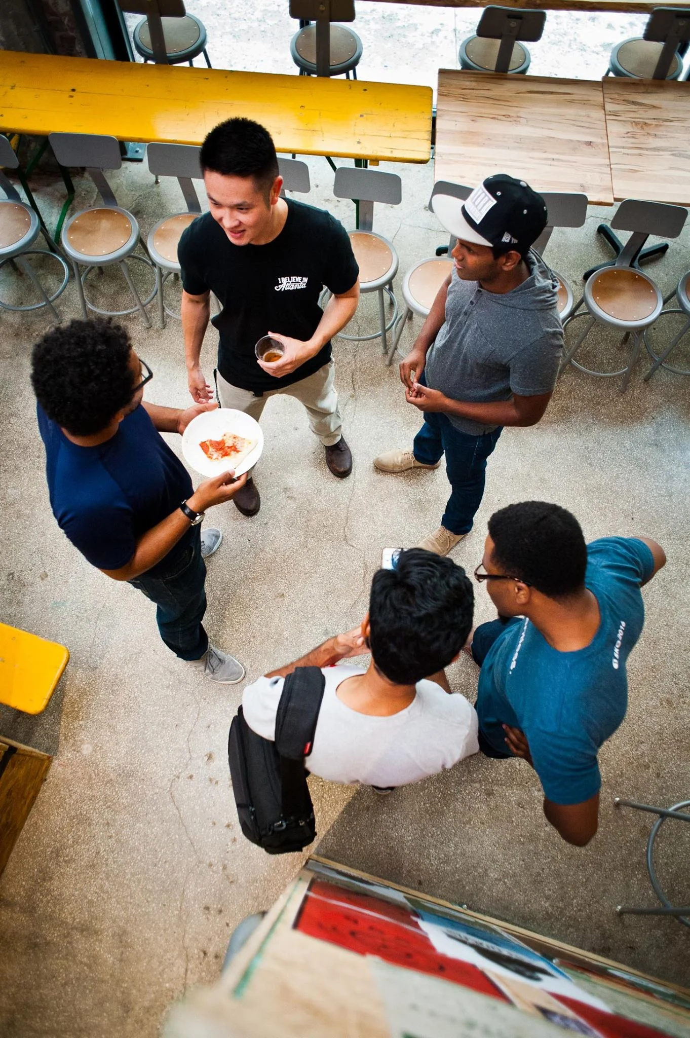 Collaboration at the Consumer Show. Clockwise from top left: David Ahn, Vamshi Adimulam, Sean Taylor, Bhargava Chiluveru and Alex Lanei. | PHOTO: Jason Seagle