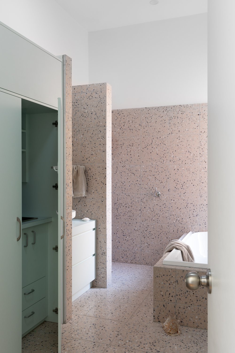 Pink terrazzo bathroom in Fitzroy Melbourne. Designed by bathroom designer and interior designer Meredith Lee