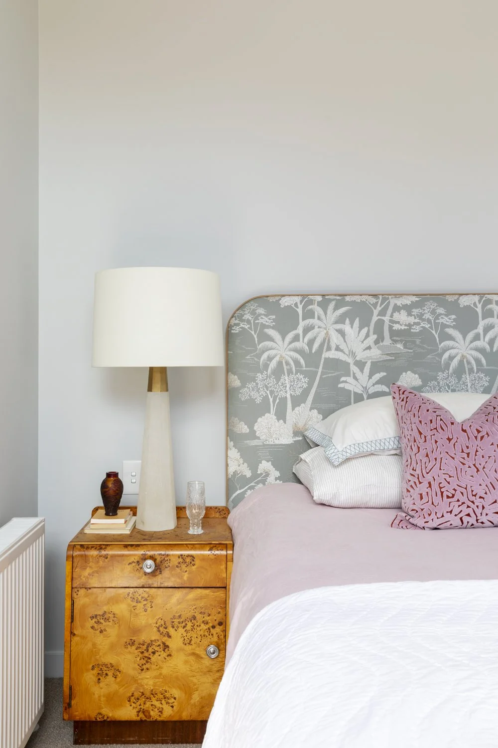 Melbourne interior designer Meredith Lee has used colour with a custom upholstered bedhead