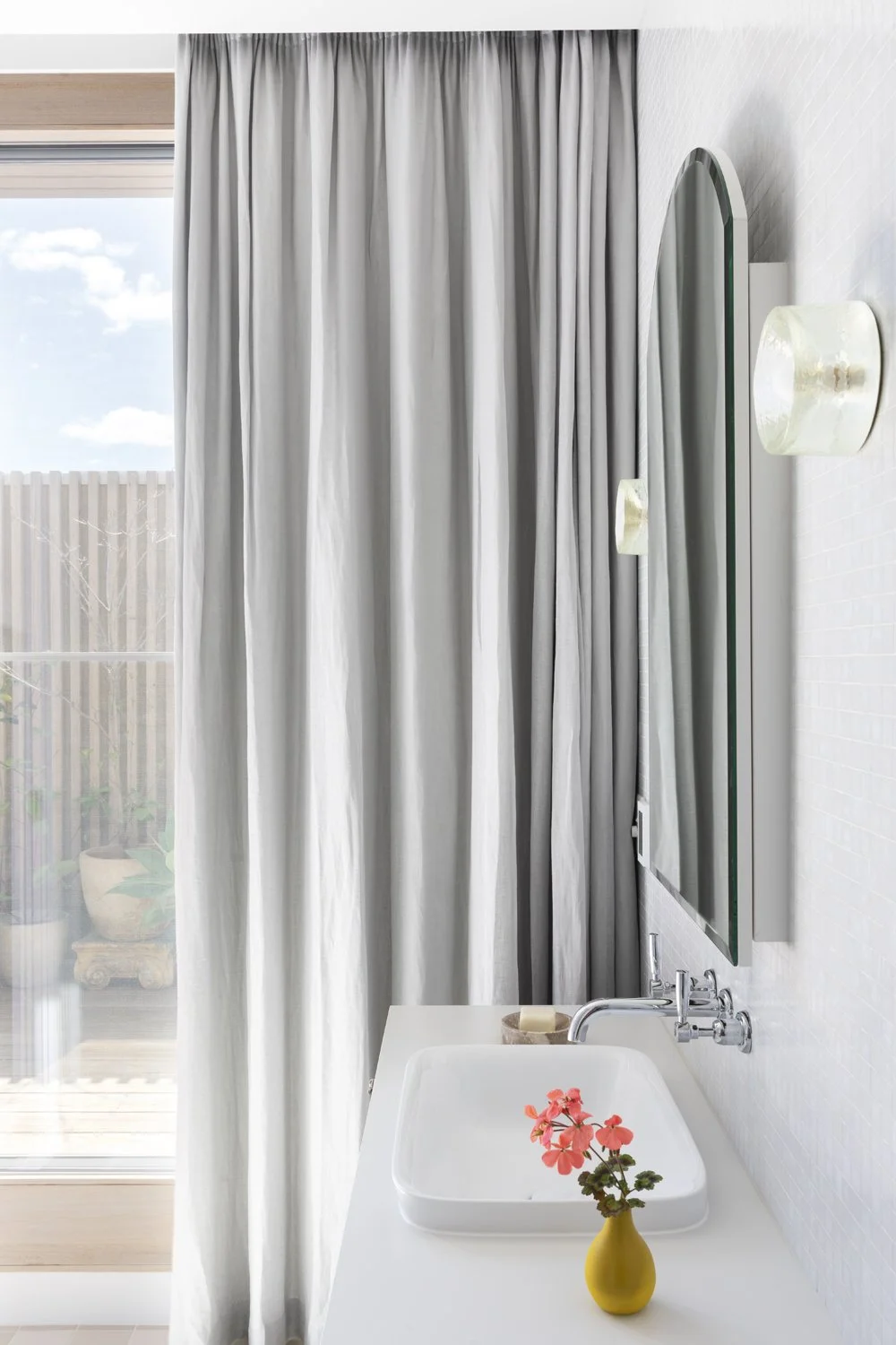 Ensuite with curtains designed by Melbourne bathroom designer Meredith Lee