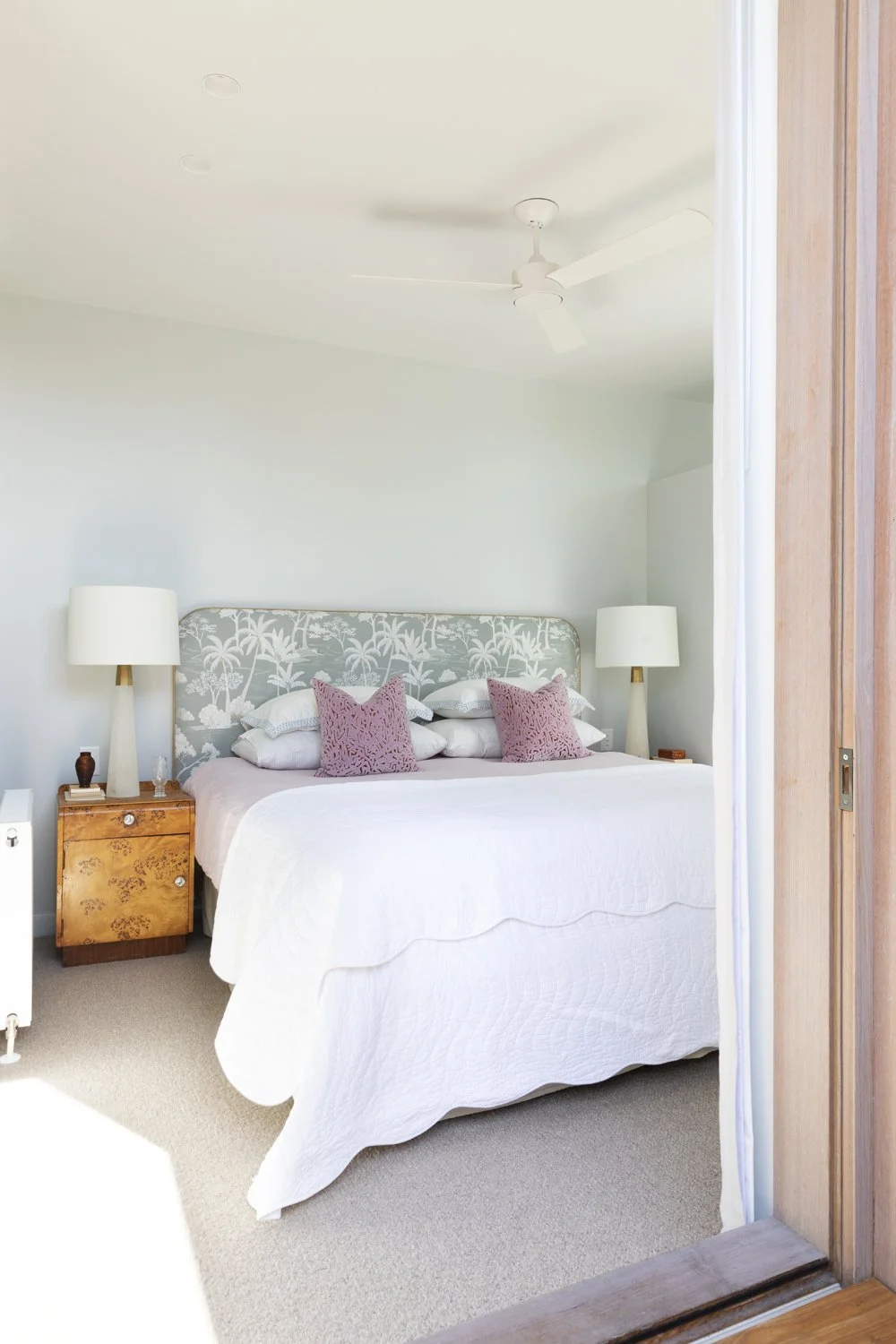 Melbourne interior designer Meredith Lee has used colour with a custom upholstered bedhead.