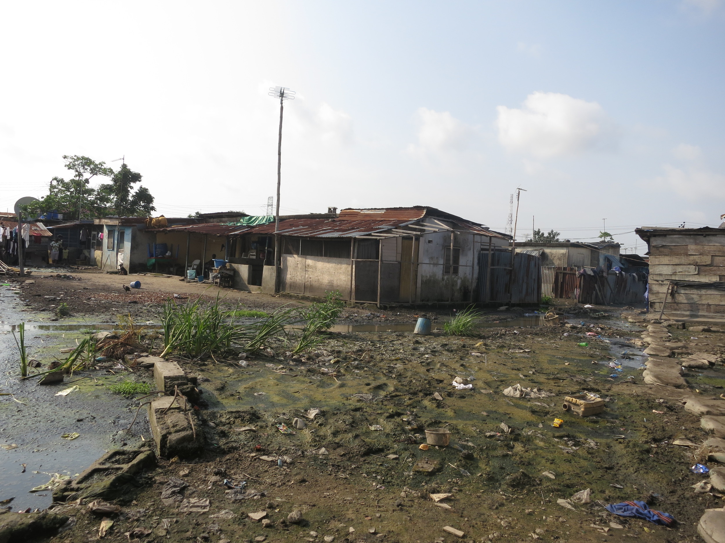 Slums are the result of inadequate, non-participatory, urban planning, and frequently struggle with flooding and nonexistent waste collection.