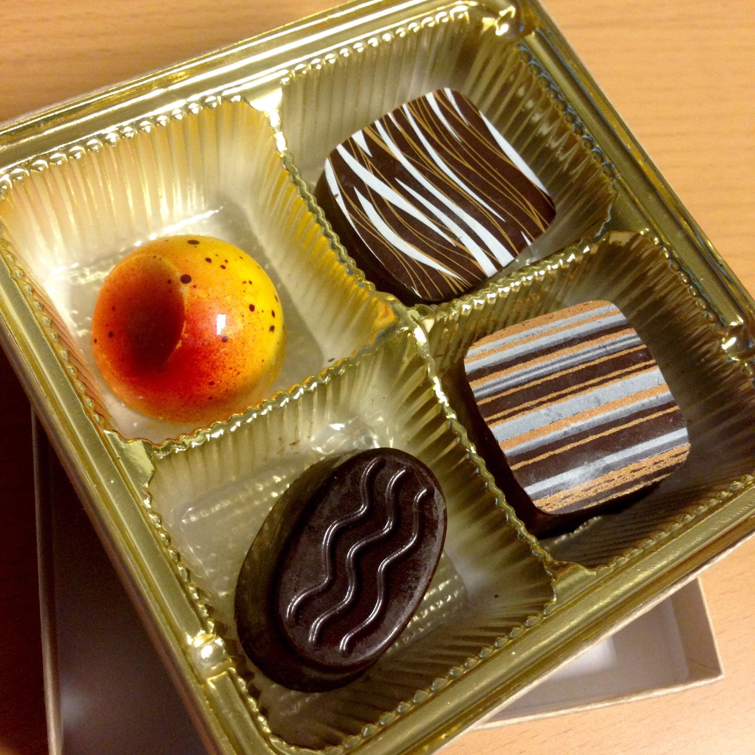 Delicious fancy chocolates from a client. These are sitting on my desk right now. OH EM YUM.