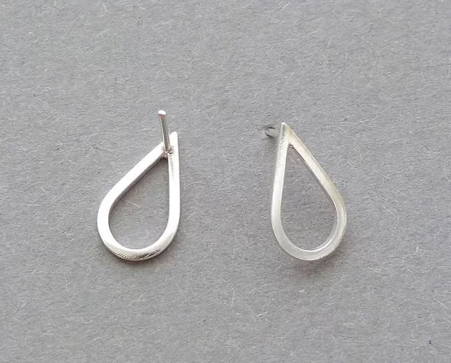 silver teardrop studs.JPG