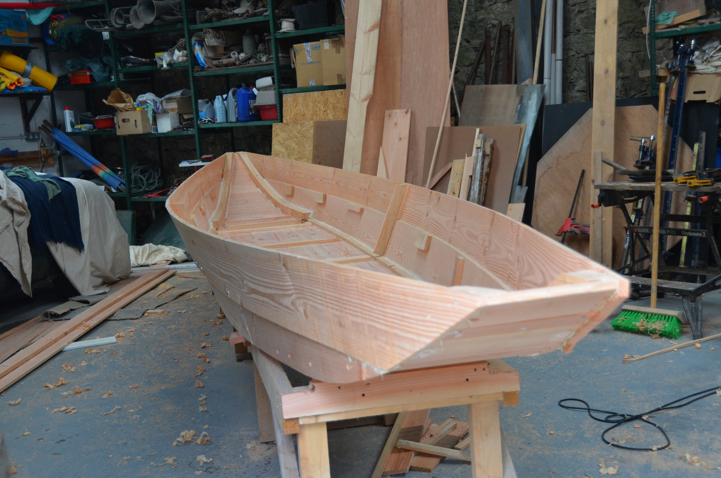 This hull was built while on a visit to Ireland in 2013 , I built the basic hull from the lines of old boats and from some written instructions relating to dimensions which we found in my grandfathers house. The boat is being finished by the owner and we will post some more pictures when he has completed the boat.