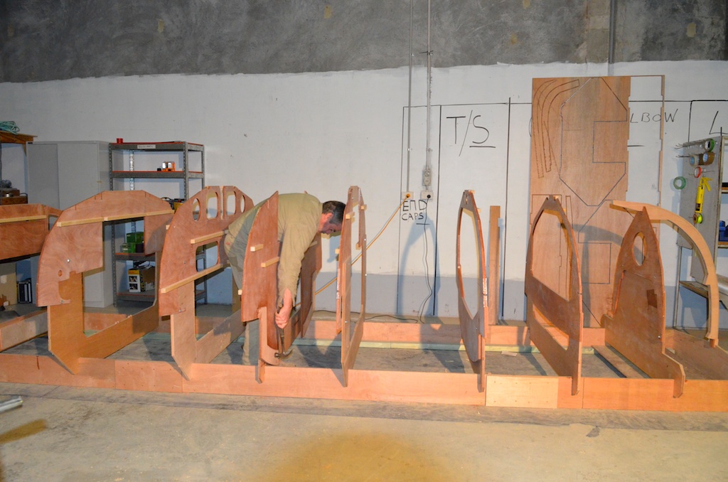 The frames are fixed to the supports with bolts, in this picture I am gently tickling the bolt in with my hammer.