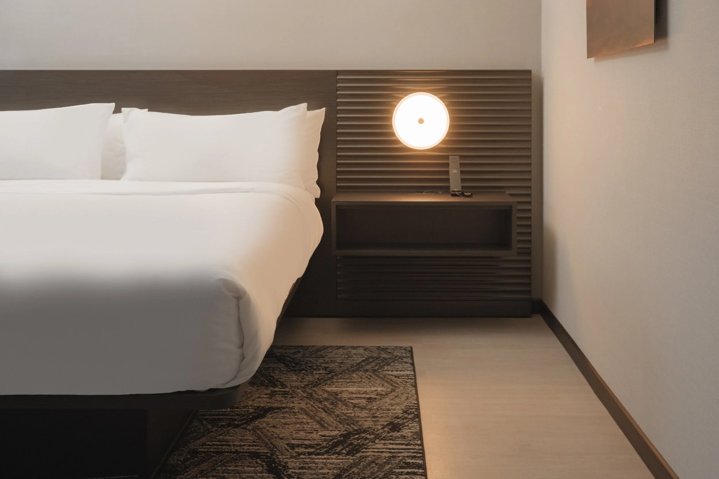 6038_AC_AVLAB_ACHotel_kingbalcony_nightstand_Web Resolution.jpg