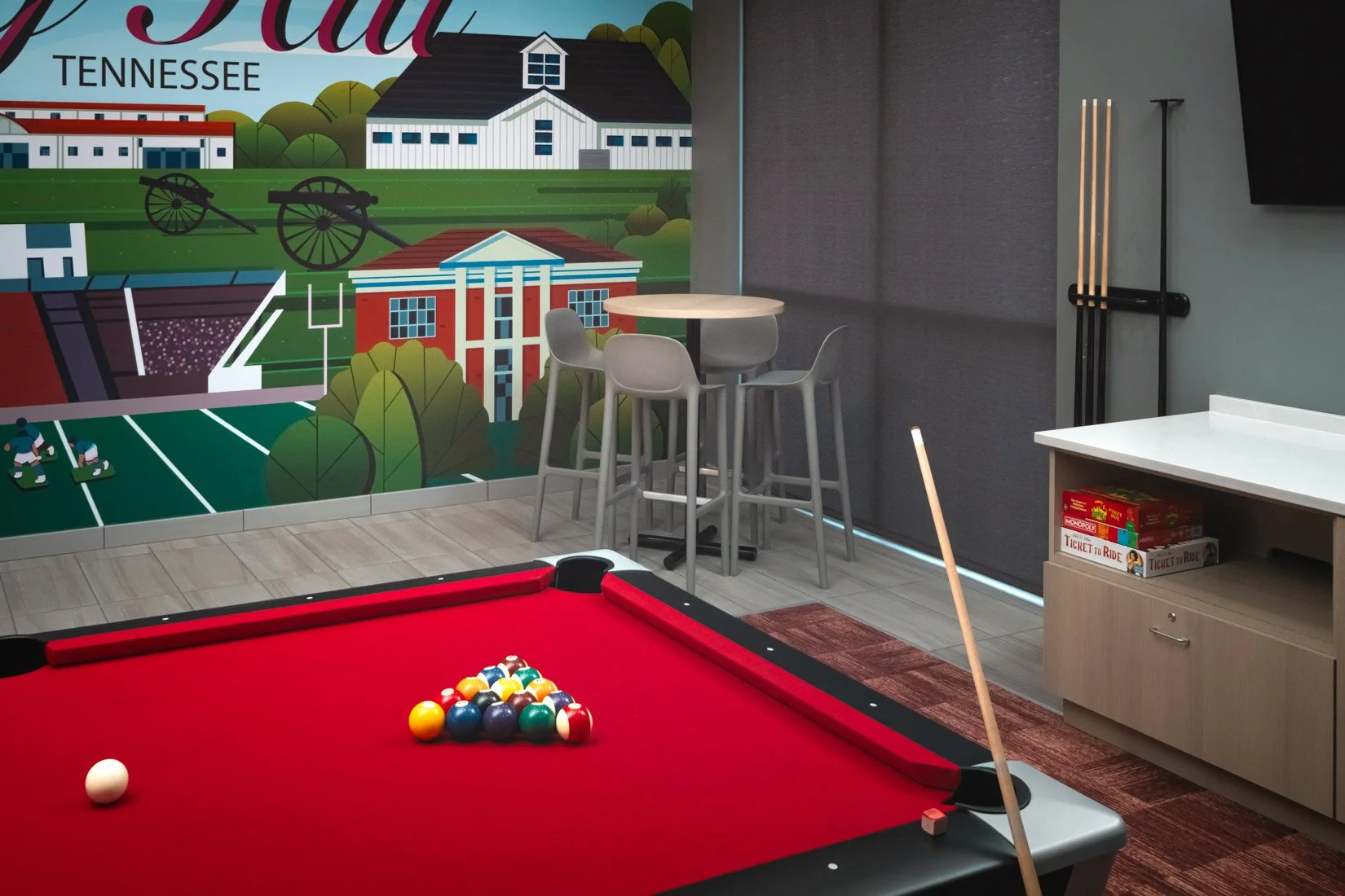  Original Filename: BNALIHT_Home2_lobbygames_4913.jpg File Name: lobby_games Caption: Lobby games area Marketing Caption: The lobby games area offers a fun place to relax at Home2 Suites by Hilton Spring Hill TN. Alternate Tag: Games area with seatin