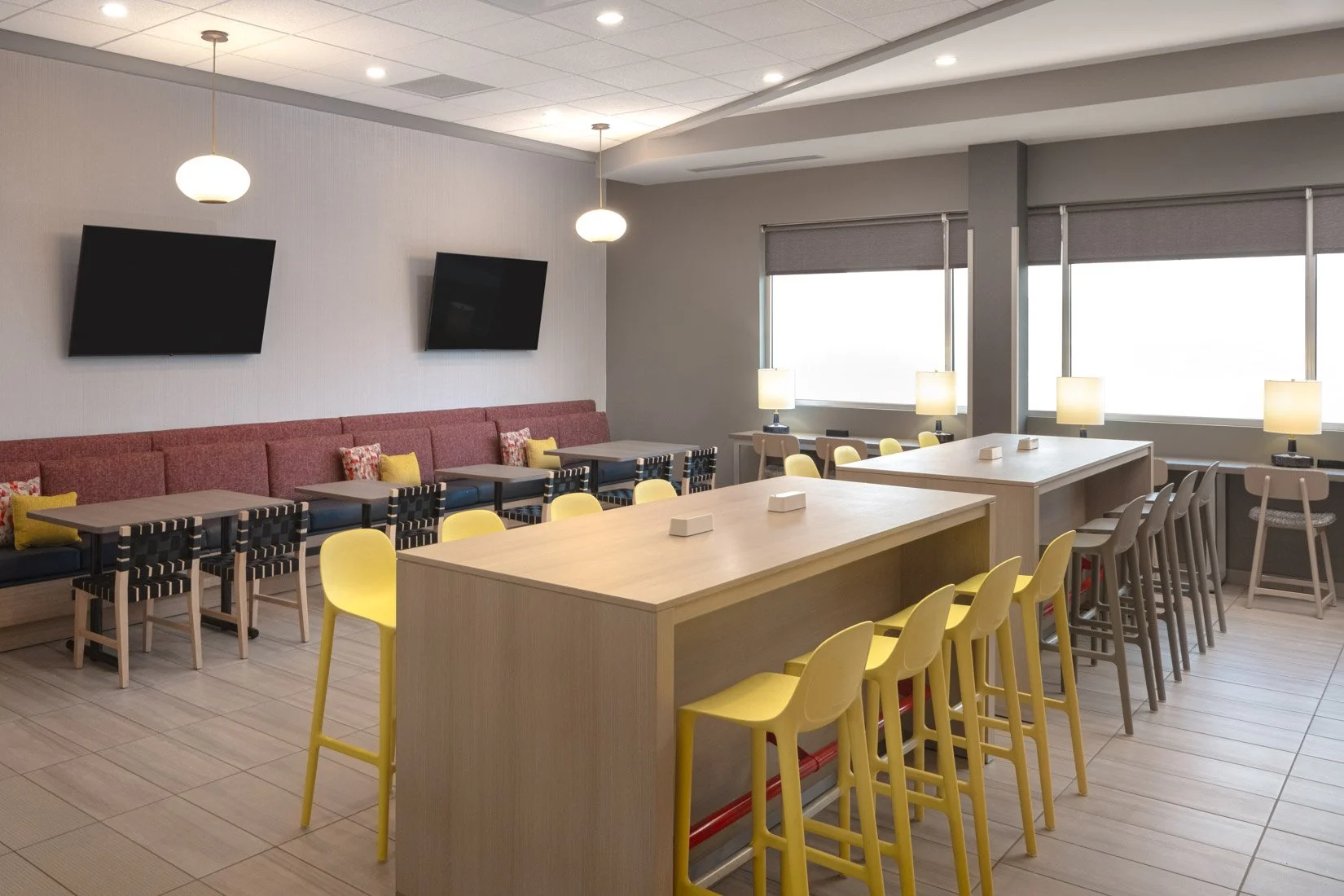  Original Filename: BNALIHT_Home2_diningroom_4915.jpg File Name: dining_room Caption: Dining room seating Marketing Caption: Guests can enjoy meals in the dining room at Home2 Suites by Hilton Spring Hill TN. Alternate Tag: Dining room with tables an