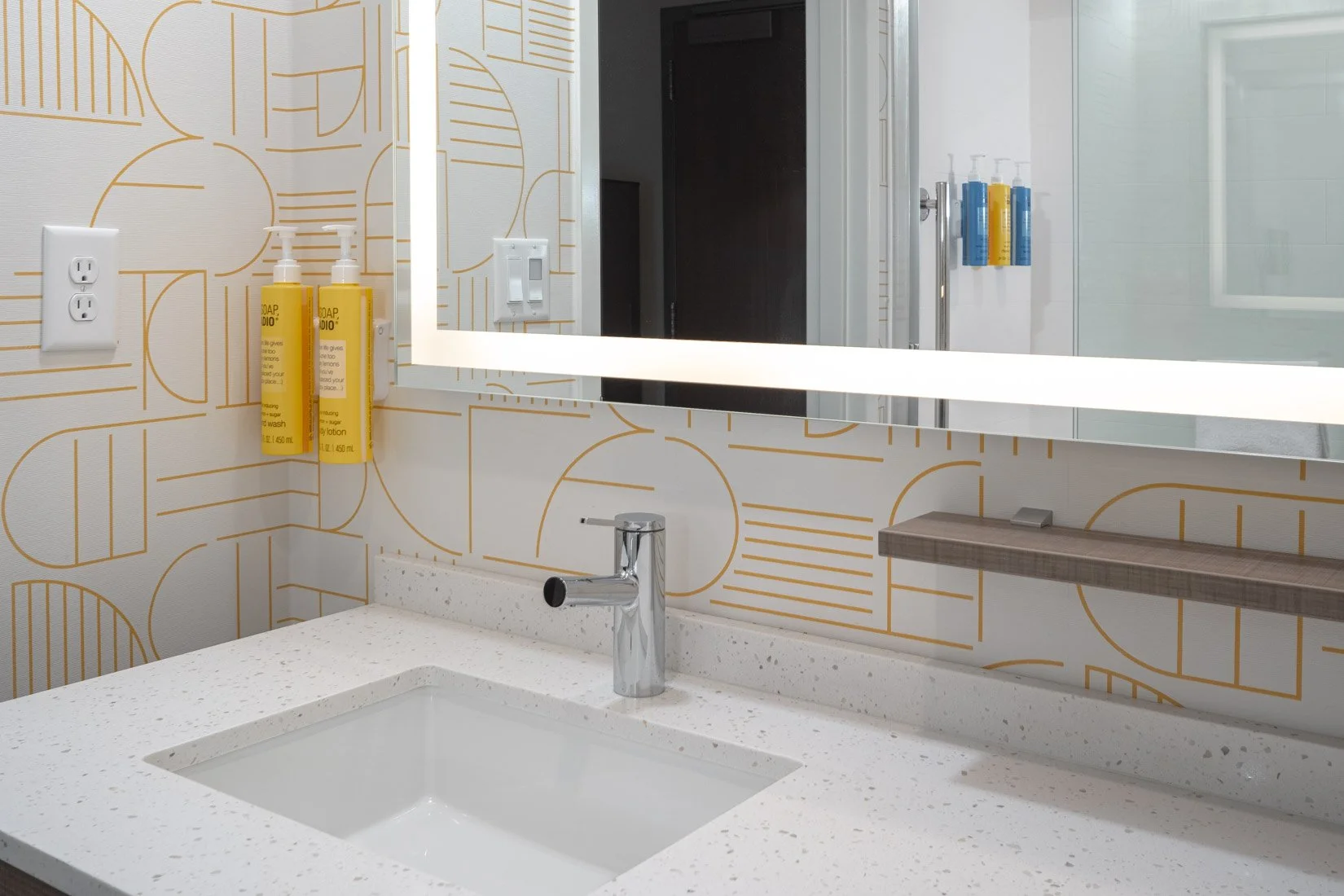  Original Filename: BNALIHT_Home2_roombath_soap_4943.jpg File Name: bathroom_amenities Caption: Bathroom amenities Marketing Caption: Bathroom amenities provided for guest comfort. Alternate Tag: Soap and toiletries displayed on bathroom counter Keyw