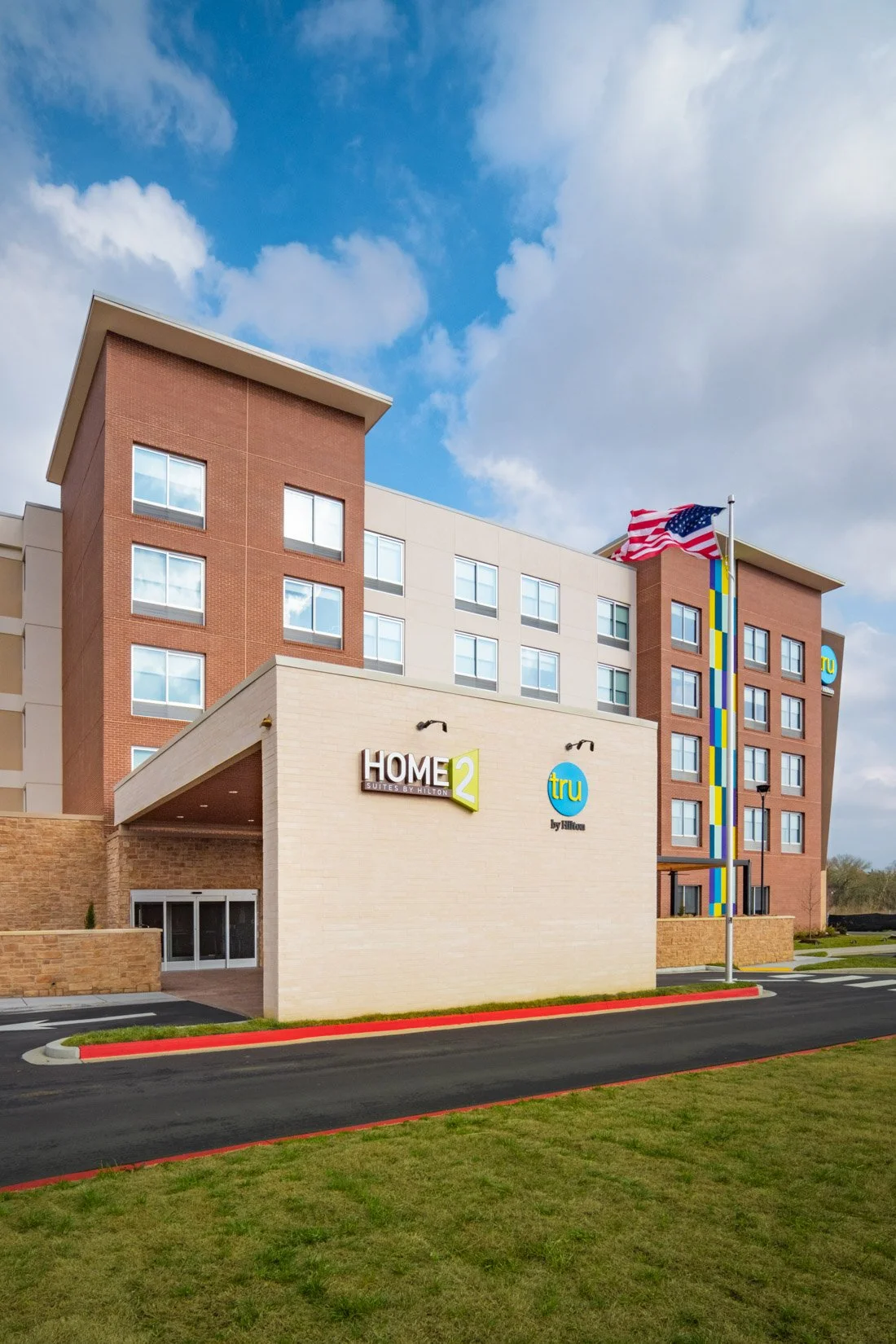  Original Filename: BNALIHT_Home2_verticalday_4903.jpg File Name: exterior_vertical Caption: Hotel exterior vertical Marketing Caption: Vertical exterior view highlighting the architecture of Home2 Suites by Hilton Spring Hill TN. Alternate Tag: Vert