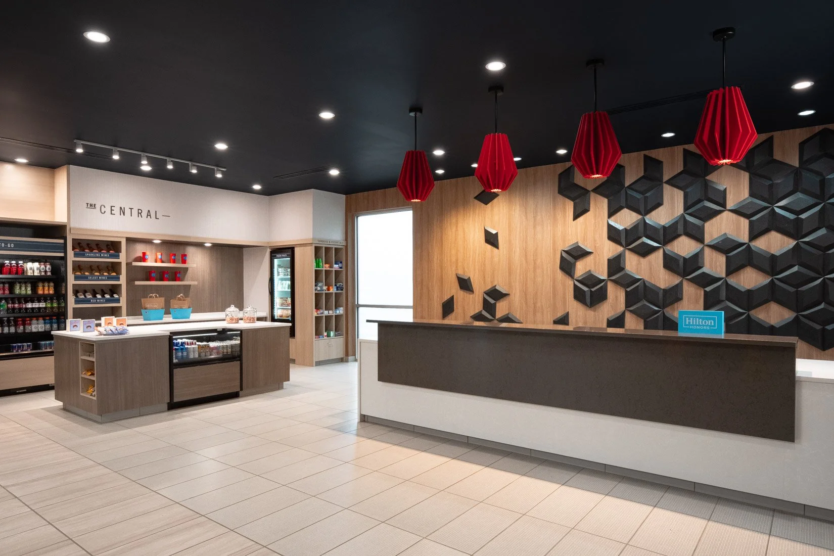  Original Filename: 3904_BNASPRU_TRU_checkin.jpg File Name: Tru-Lobby-Checkin.jpg Caption: Hotel lobby check-in area Marketing Caption: Welcoming check-in area at Tru by Hilton Spring Hill designed for a fast and friendly arrival experience. Alternat