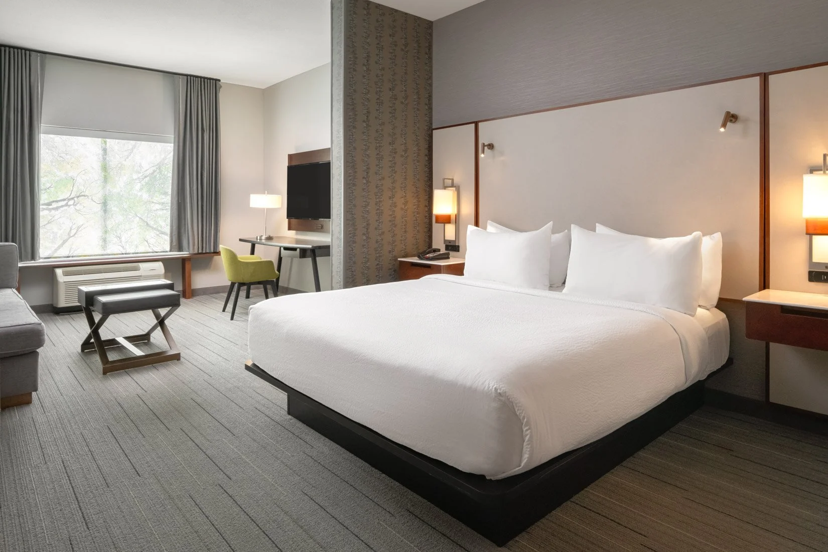  Original Filename: 1705_GTLFG_Fairfield_kingsuitebed.jpg File Name: GTLFG-King-Suite-Bedroom.jpg Caption: King suite bedroom Marketing Caption: Spacious king suite bedroom at Fairfield Inn &amp; Suites Gatlinburg Downtown designed for comfort and re