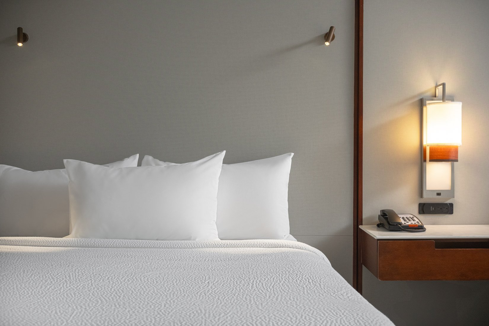  Original Filename: 1713_GTLFG_Fairfield_roomreadinglights.jpg File Name: GTLFG-Guestroom-Reading-Lights.jpg Caption: Guest room bed with reading lights Marketing Caption: Comfortable guest bed with modern reading lights at Fairfield Inn &amp; Suites