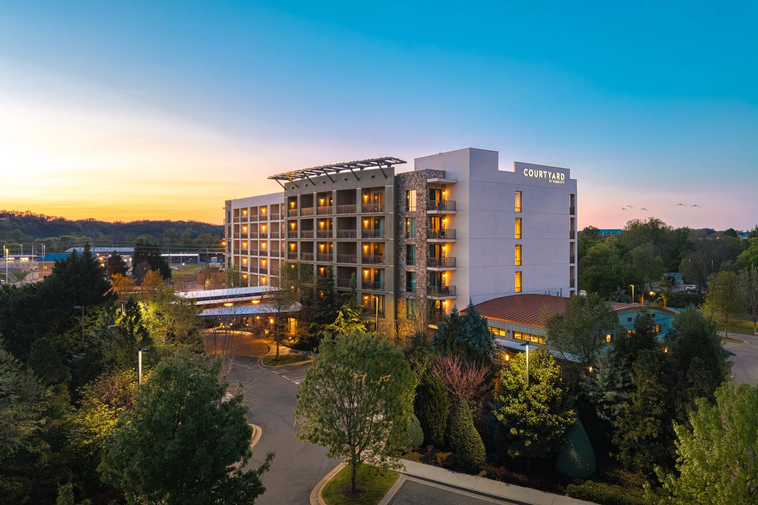   ORIGINAL FILENAME:  4901_TYSCP_Courtyard_exteriordusk.jpg  FILE NAME:  Exterior  PHOTO PLACEMENT TAG:  Search in DAC for: Exterior  CAPTION:  Exterior at Dusk  MARKETING CAPTION:  The exterior at dusk introduces Courtyard Pigeon Forge with illumina