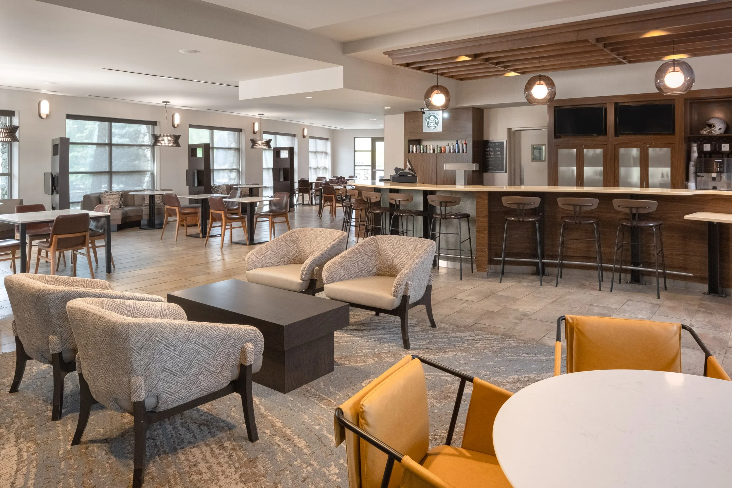  ORIGINAL FILENAME:  4904_TYSCP_Courtyard_diningroom.jpg  FILE NAME:  Dining  PHOTO PLACEMENT TAG:  Search in DAC for: Dining  CAPTION:  Bistro Dining Area  MARKETING CAPTION:  The Bistro dining area offers booth seating, tables, and a service counte
