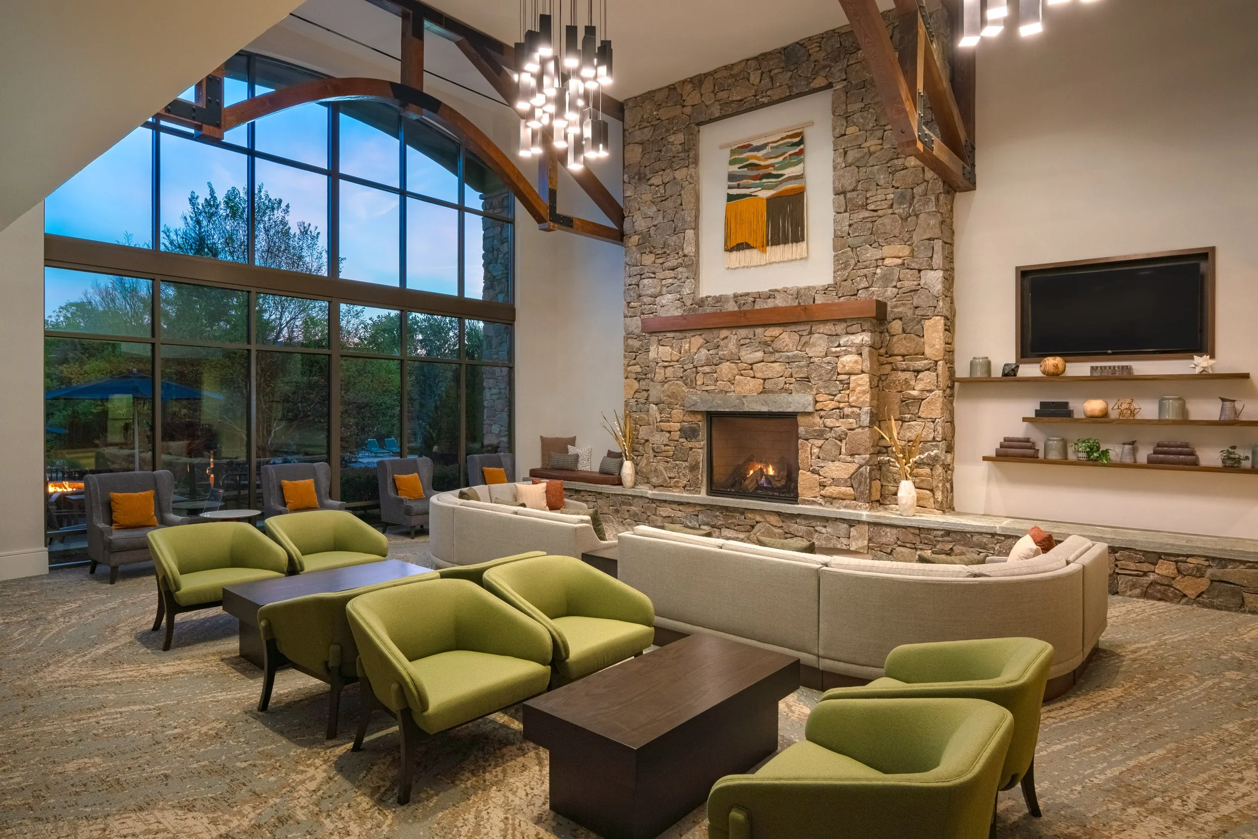  ORIGINAL FILENAME:  4911_TYSCP_Courtyard_greatroom.jpg  FILE NAME:  Great Room  PHOTO PLACEMENT TAG:  Search in DAC for: Lobby  CAPTION:  Great Room  MARKETING CAPTION:  The Great Room features comfortable seating, a stone fireplace, large windows, 