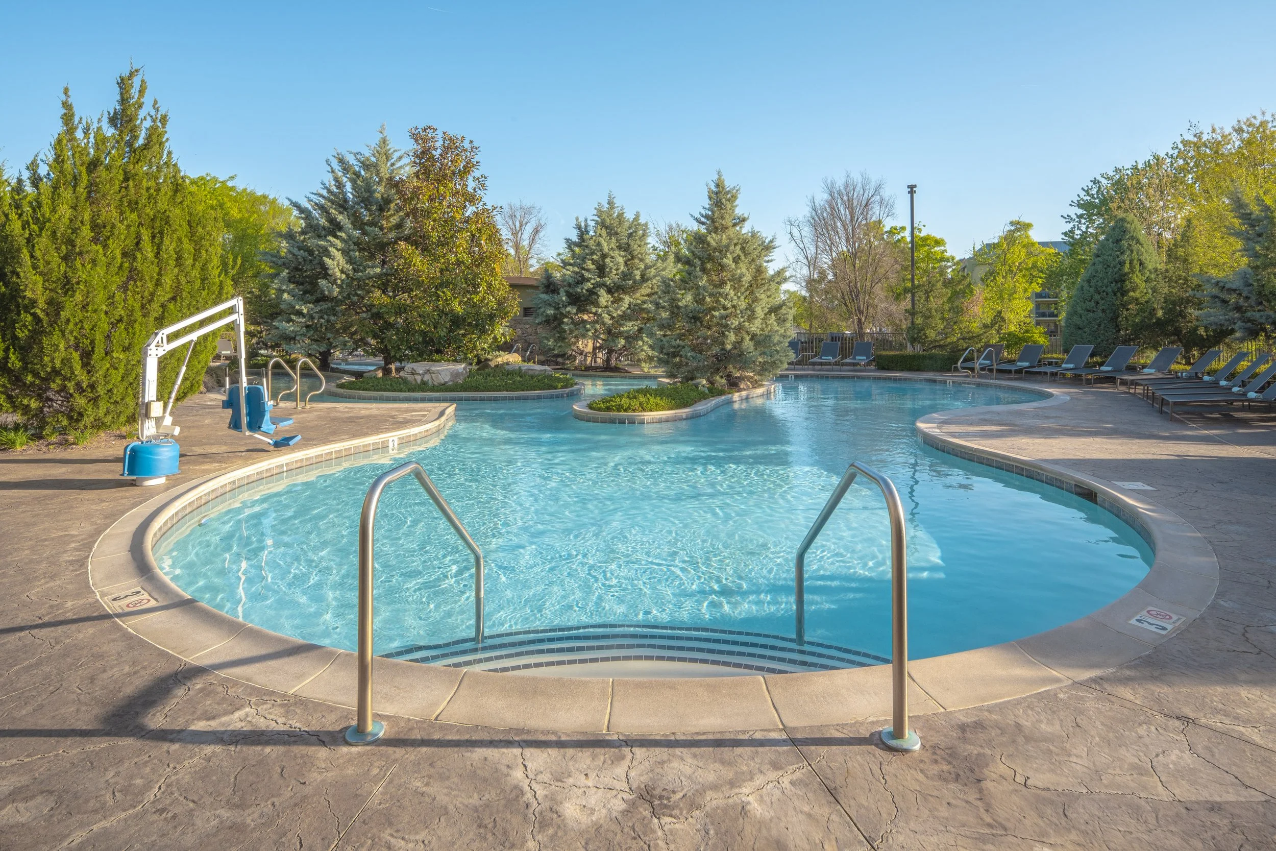 ORIGINAL FILENAME:  4915_TYSCP_Courtyard_outdoorpool.jpg  FILE NAME:  Outdoor Pool  PHOTO PLACEMENT TAG:  Search in DAC for: Recreation &amp; Fitness  CAPTION:  Outdoor Pool  MARKETING CAPTION:  The outdoor pool area includes lounge chairs, landscap