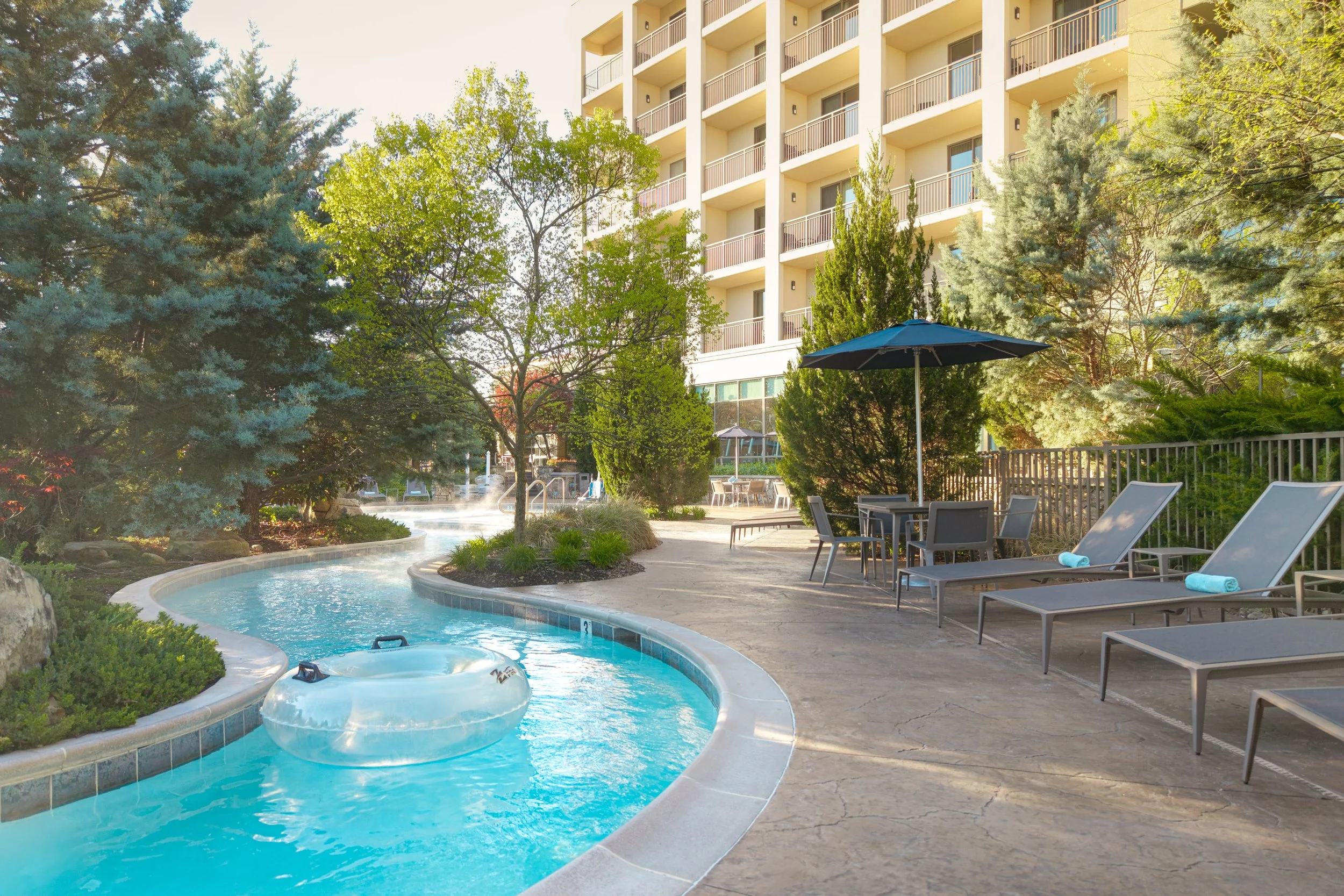  ORIGINAL FILENAME:  4916_TYSCP_Courtyard_pool_lazyriver.jpg  FILE NAME:  Lazy River  PHOTO PLACEMENT TAG:  Search in DAC for: Recreation &amp; Fitness  CAPTION:  Lazy River Pool  MARKETING CAPTION:  The outdoor lazy river pool area includes lounge s