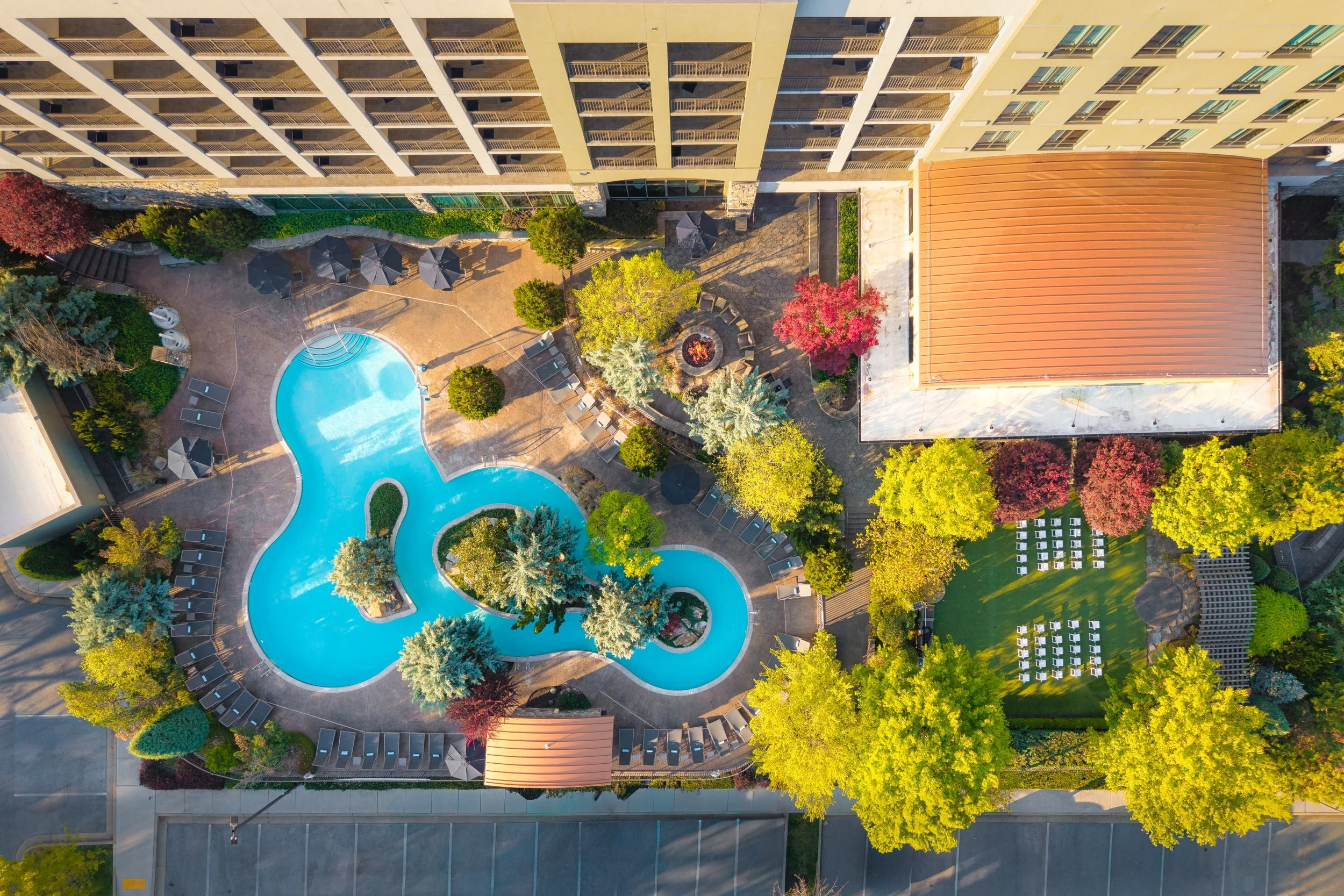  ORIGINAL FILENAME:  4917_TYSCP_Courtyard_pool_drone.jpg  FILE NAME:  Pool Aerial  PHOTO PLACEMENT TAG:  Search in DAC for: Recreation &amp; Fitness  CAPTION:  Pool Aerial  MARKETING CAPTION:  The aerial view shows the outdoor pool area, patio seatin