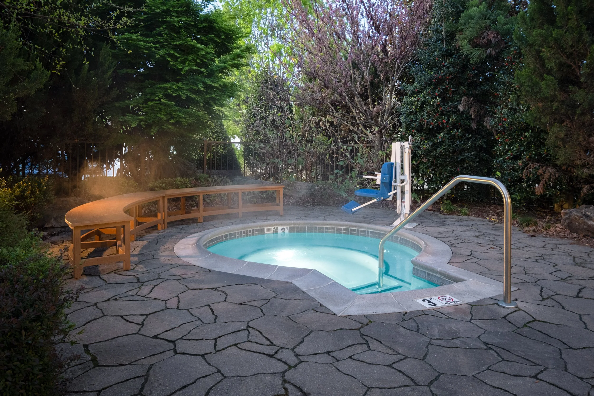  ORIGINAL FILENAME:  4918_TYSCP_Courtyard_outdoorhottub.jpg  FILE NAME:  Hot Tub  PHOTO PLACEMENT TAG:  Search in DAC for: Recreation &amp; Fitness  CAPTION:  Outdoor Hot Tub  MARKETING CAPTION:  The outdoor hot tub is set within a landscaped stone p